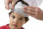 Een kind heeft een knobbel op zijn voorhoofd - hoe gevaarlijk is het en wat moet er gedaan worden?